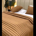 couvre lit matelassés